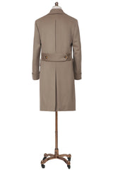 Beige trench coat on a mannequin against a white background